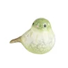 Oiseau coloris vert en terre cuite - 6,5 x 7 cm