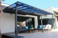Pergola adossée polycarbonate, acier, aluminium COULEURS DU MONDE - modèle Stockholm - 3,5x6m