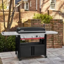 Plancha à gaz en fonte émaillée noire sur chariot Weber - 76 cm