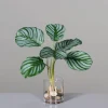 Plante verte artificielle en vase transparent illusion d'eau - 33 cm