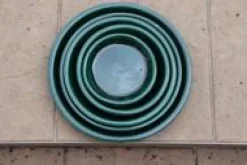 Soucoupe en terre émaillée vert Jade Les Poteries d’Albi - Ø 18 cm